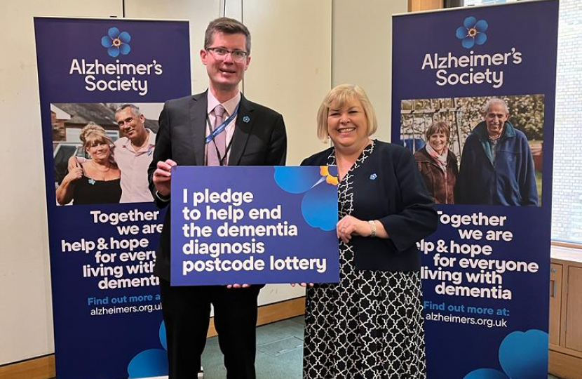 Jane speaking to a representative of Alzheimer's Society.