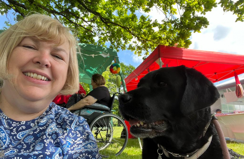 Jane and one of her three dogs at the dog show