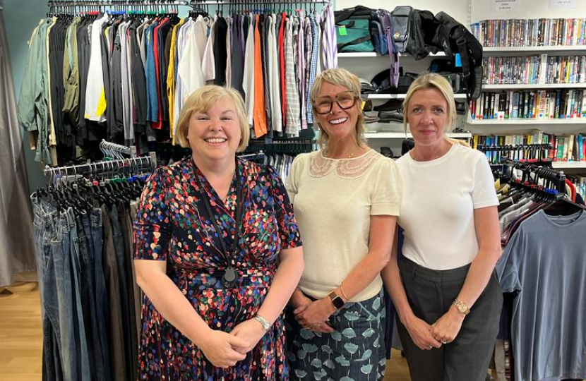 Jane and one of her caseworkers at the shop