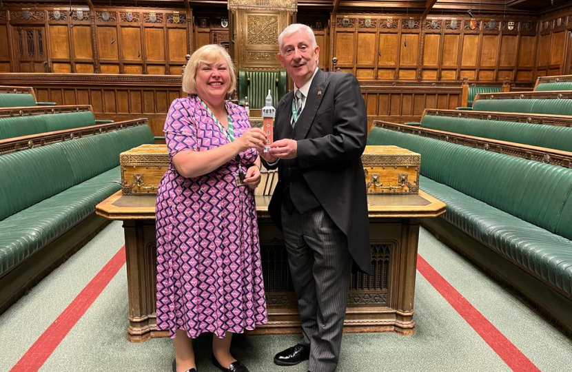 Jane and the Speaker holding a model of the Carillon