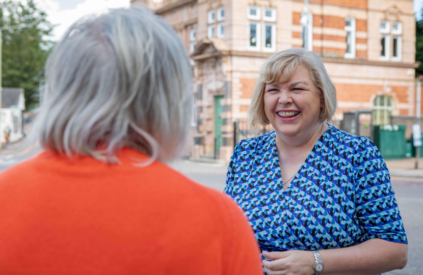 Jane talking to a resident