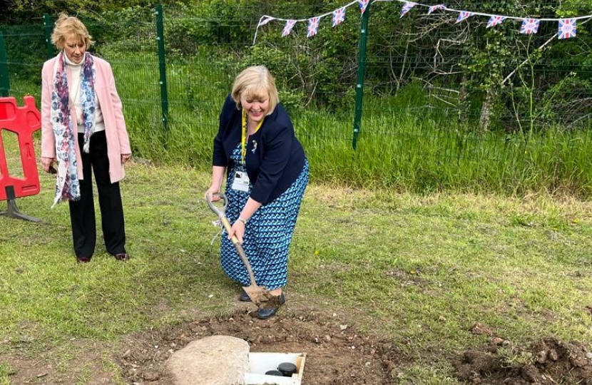 Jane burying the Coronation Time Capsule