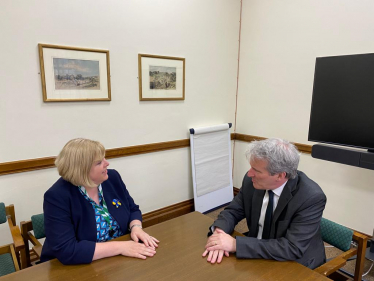 Jane speaking to Minster Hinds