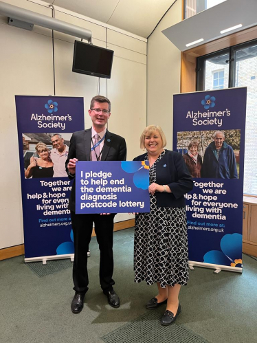 Jane speaking to a representative of Alzheimer's Society.