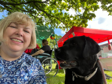 Jane and one of her three dogs at the dog show