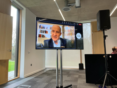 Business Minister Kevin Hollinrake talking to the meeting (virtually).