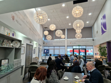 Business leaders listening to the speaker at the Business Breakfast